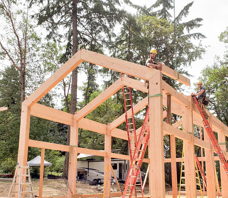 Kelsey and Quentin on the Lesh Timber Frame