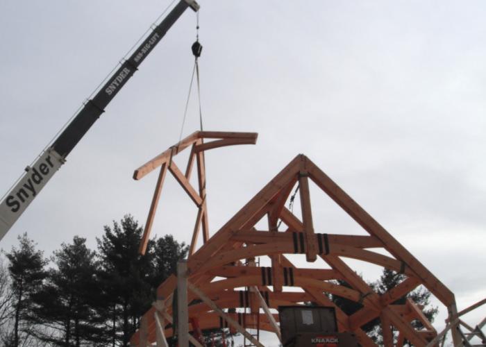 timber_frame_metal_strap_raising.jpg