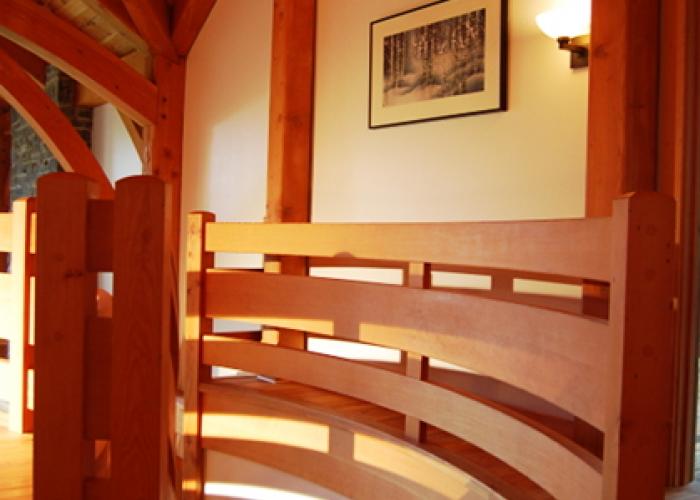 curving_stair_in_timber_frame_by_woodworks.jpg