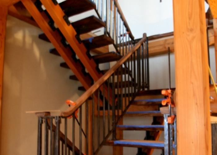 walnut_stair_install_timber_frame_home.jpg