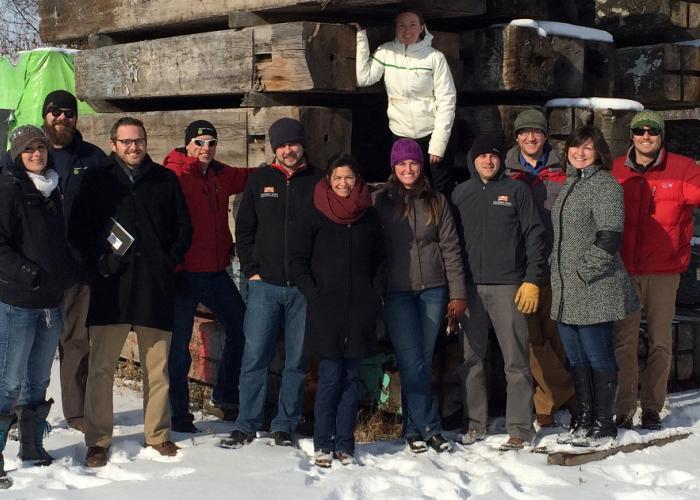 team_photo_in_reclaimed_wood_yard.jpg