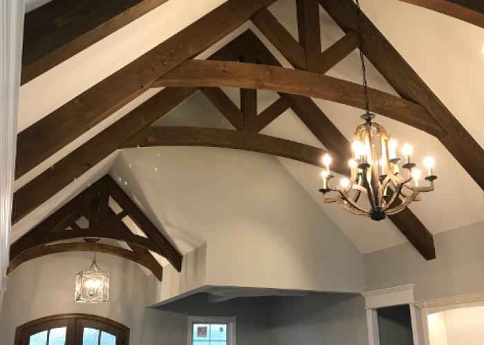 custom_stained_crank_up_trusses_in_living_room.jpg
