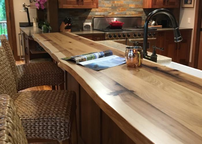 live_edge_hickory_top_and_walnut_cabinetry_newwoodworks.jpg