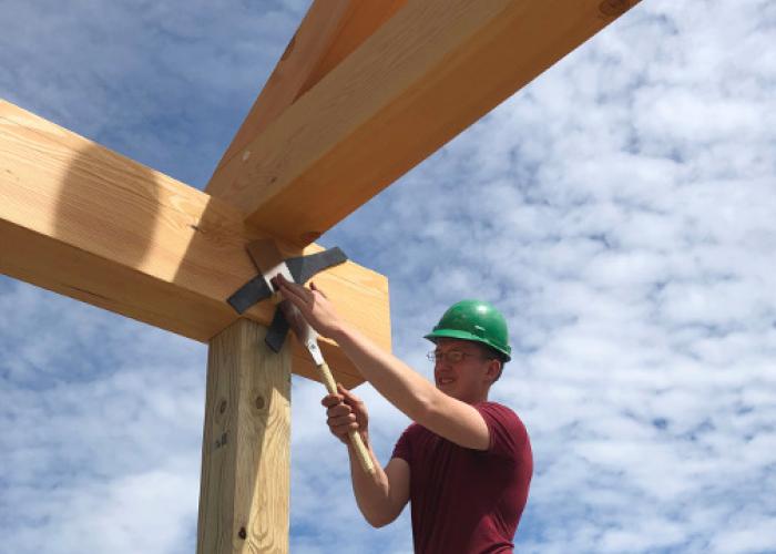 sam_trimming_peg_farmington_raising.jpg