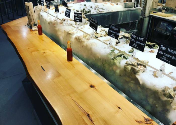 live_edge_top_oyster_bar_by_pioneer_millworks.jpg