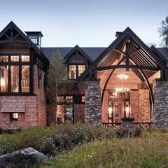 Glulam beams can incorporate a variety of finishing techniques, just like traditional timber framing, to fit with a variety of designs and styles.