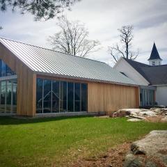 This addition to a local history museum incorporates mass timber to blend historical building materials with contemporary design, offering a way for visitors to connect with the history of the area.